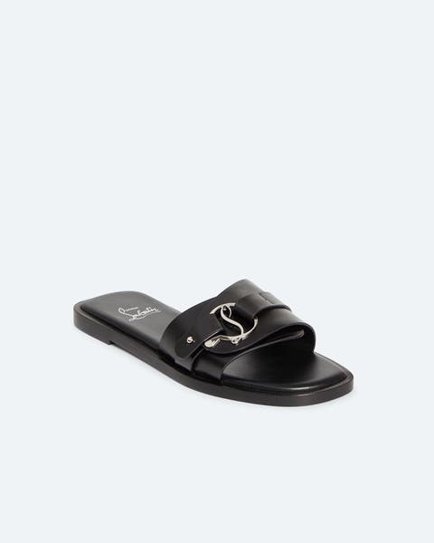 Christian Louboutin sandals.