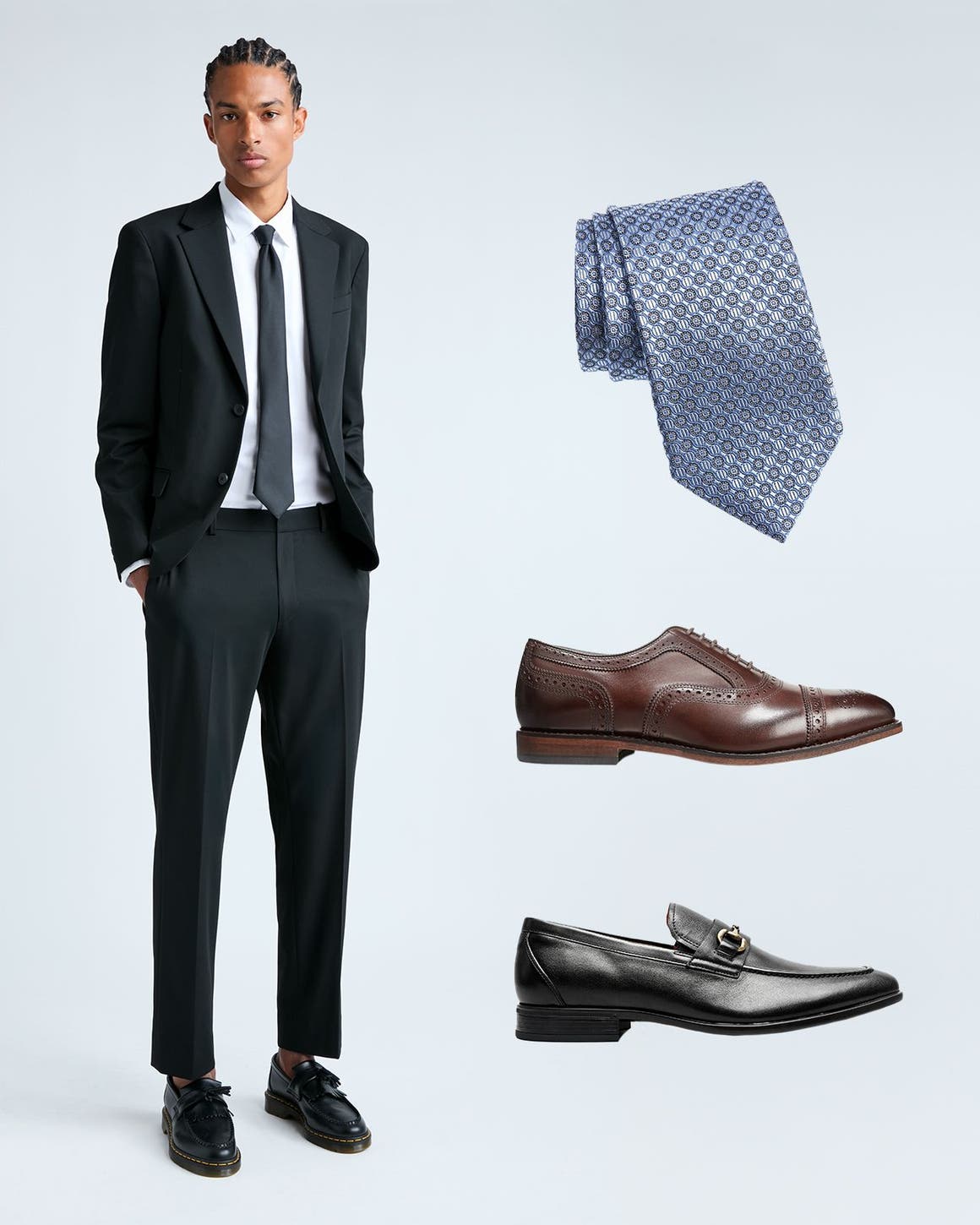 A man in a suit. Dress shoes and a tie.