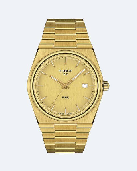 Gold Tissot watch.