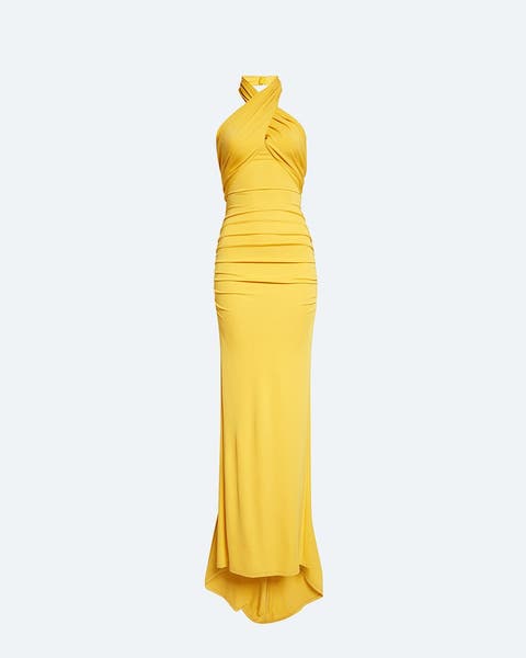 Model wearing a Carolina Herrera evening gown in yellow.