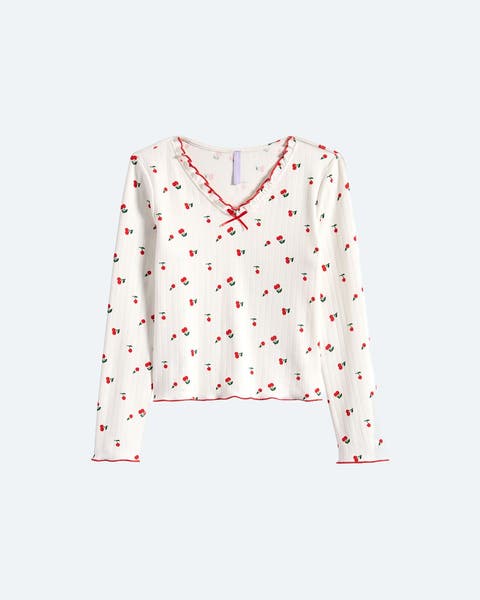 A cherry print, long-sleeve tee.
