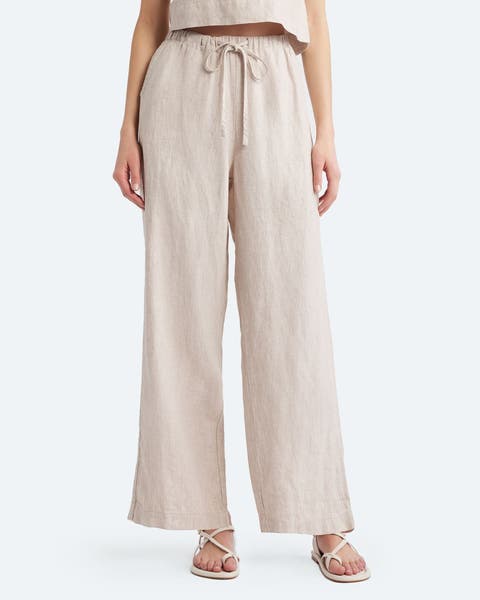 A pair of beige linen pants.