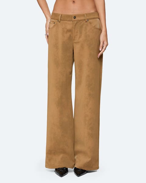 A pair of tan suede effect pants.