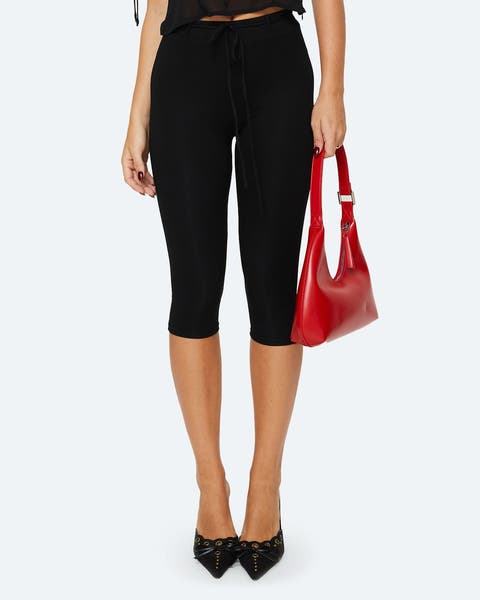 A pair of cropped black capris.
