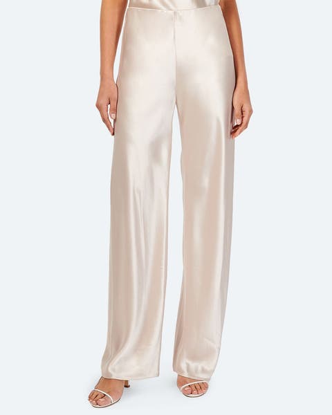 A pair of light pink satin pants.