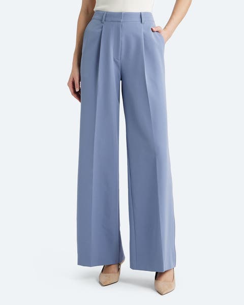 A pair of periwinkle tailored trousers.