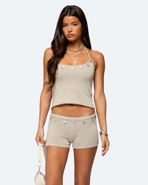 A woman wearing micro shorts and matching halter top.