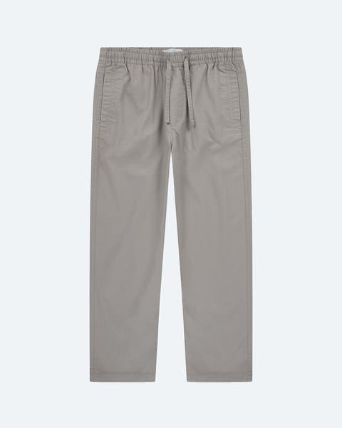 A pair of grey drawstring pants.