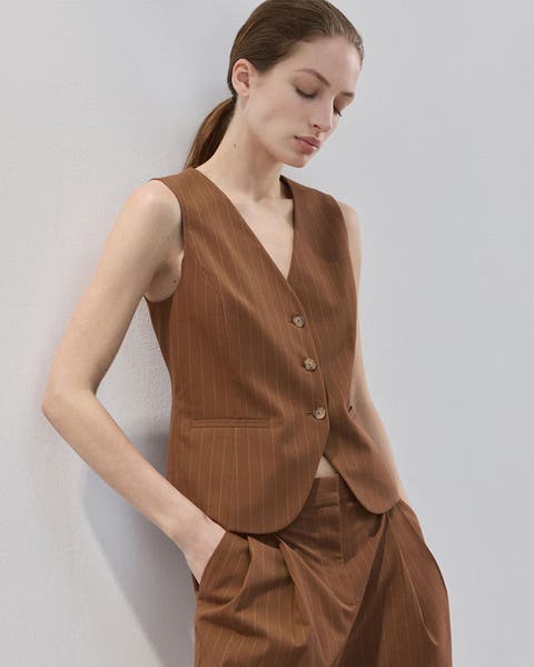 Brown pinstripe shorts.