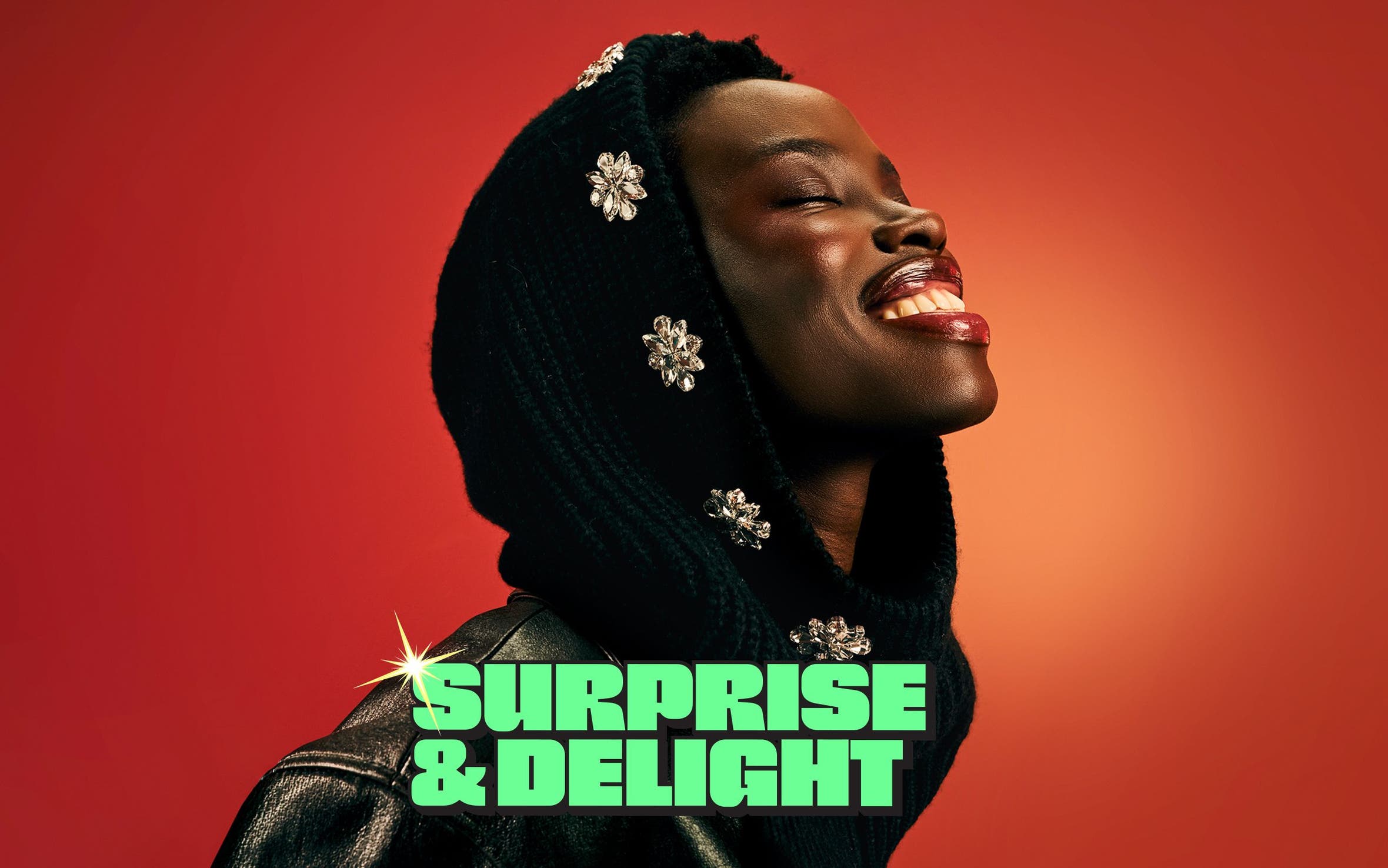 Surprise and delight. A woman wearing a bejeweled scarf around her head. 