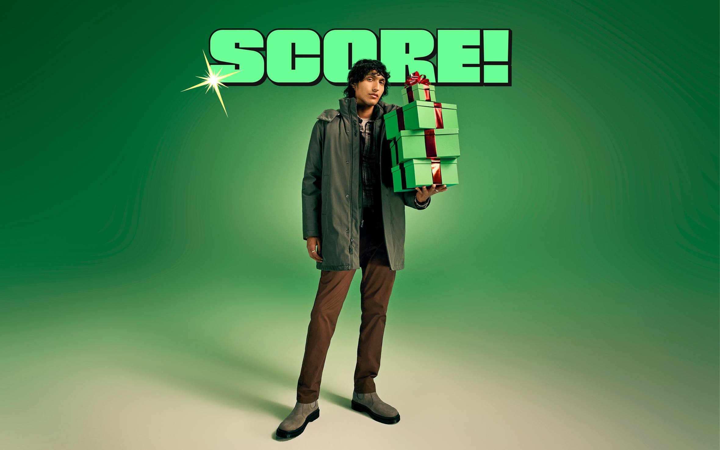 Score! A man poses with a stack of gifts.