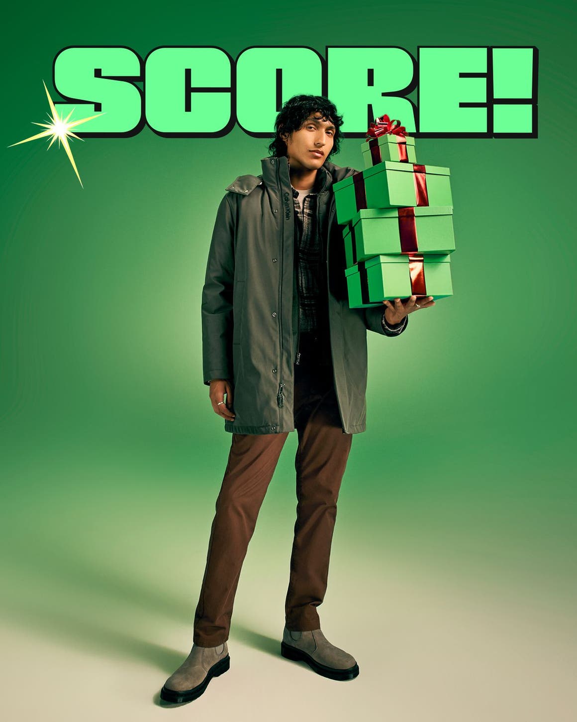 Score! A man poses with a stack of gifts.