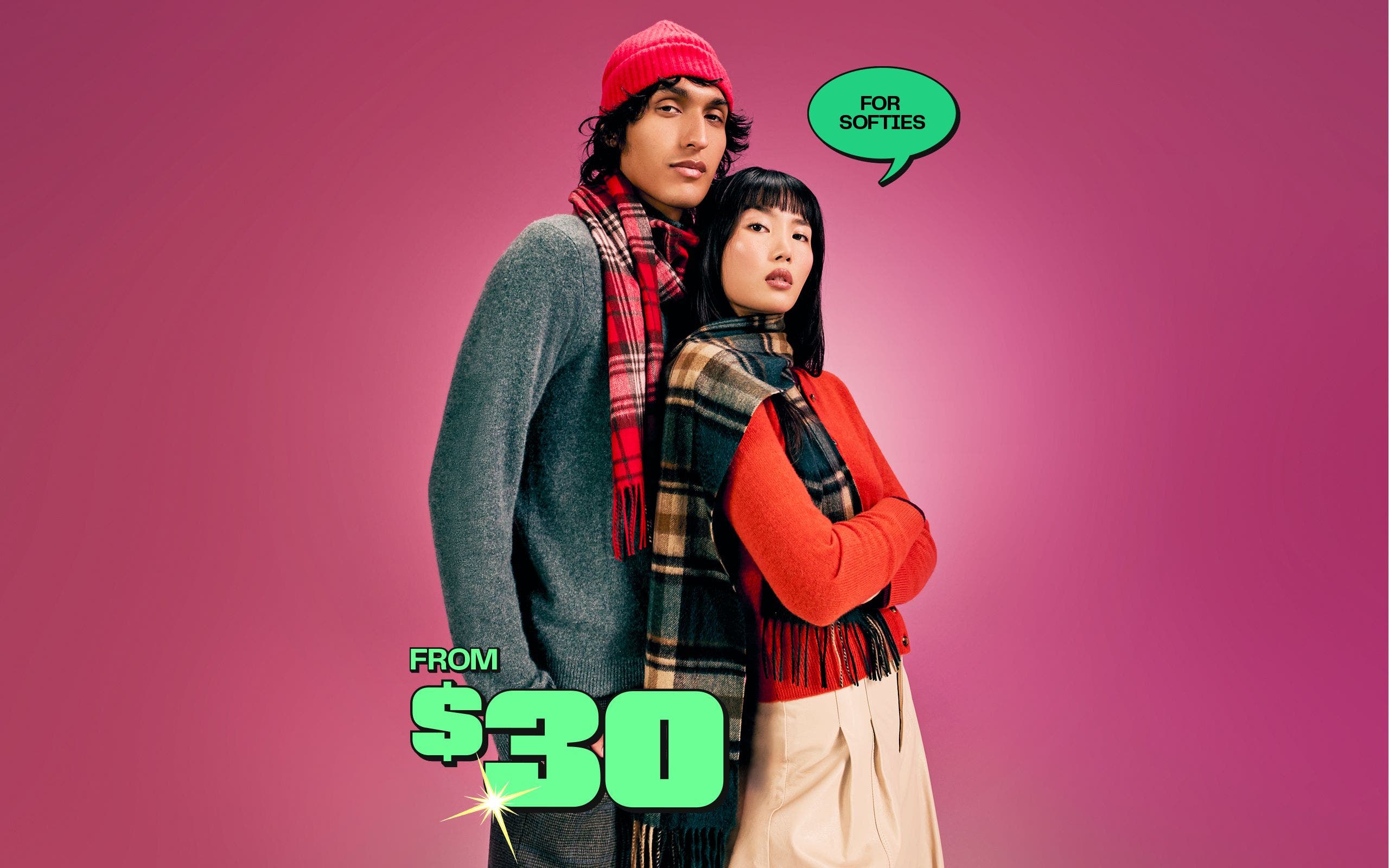  Cashmere from $30. A man and woman pose wearing cashmere sweaters and scarves. 