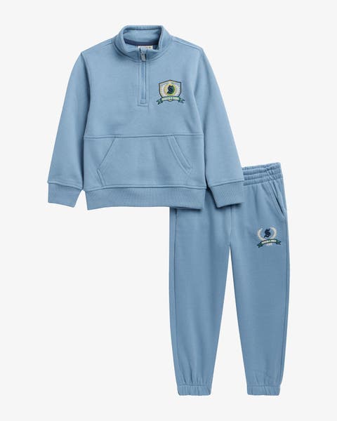 Kid's blue zip-up and track pants.