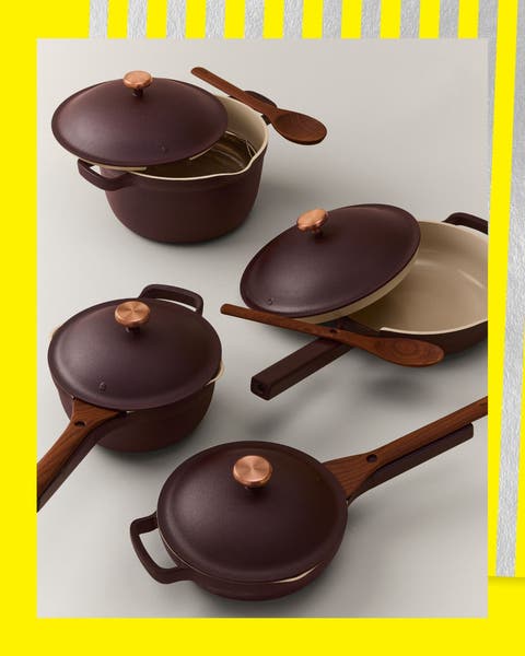 Four lidded pans with spatulas.