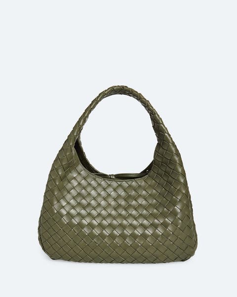 Green handbag by Bottega Veneta.