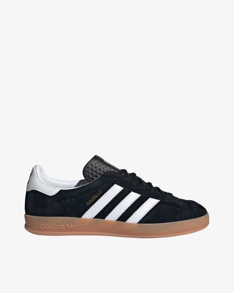 A black adidas sneaker.