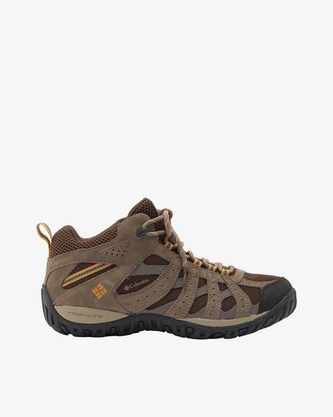 Brown waterproof mid hiking shoe with black lugged sole.