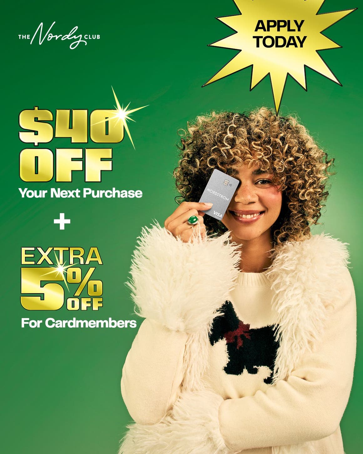 Apply today and get approved, then get $40 off your next purchase plus an extra 5% off when you use your Nordstrom credit card. A woman holding a credit card.