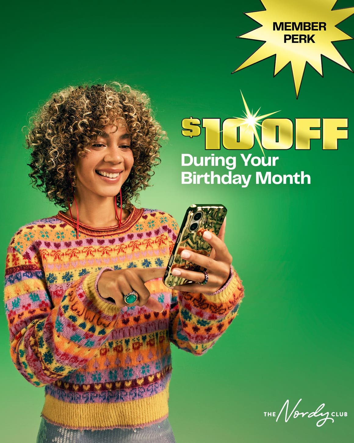 Member perk: annual birthday perk. A woman looking at her phone.