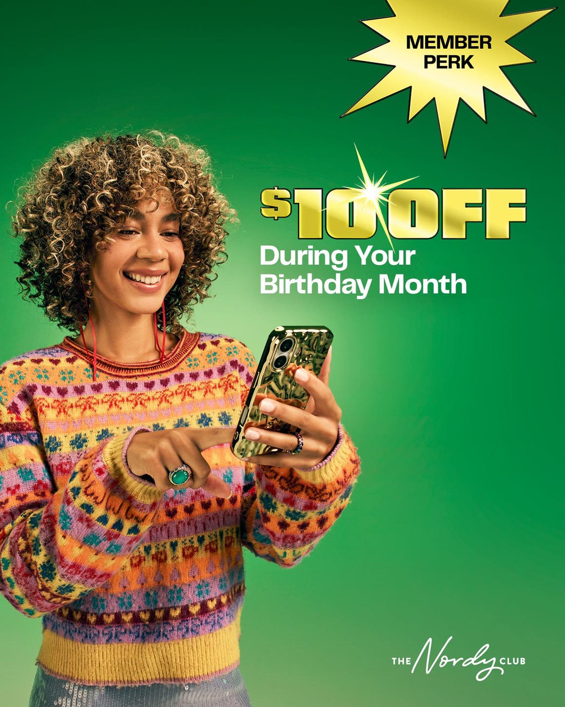 Member perk: annual birthday perk. A woman looking at her phone.