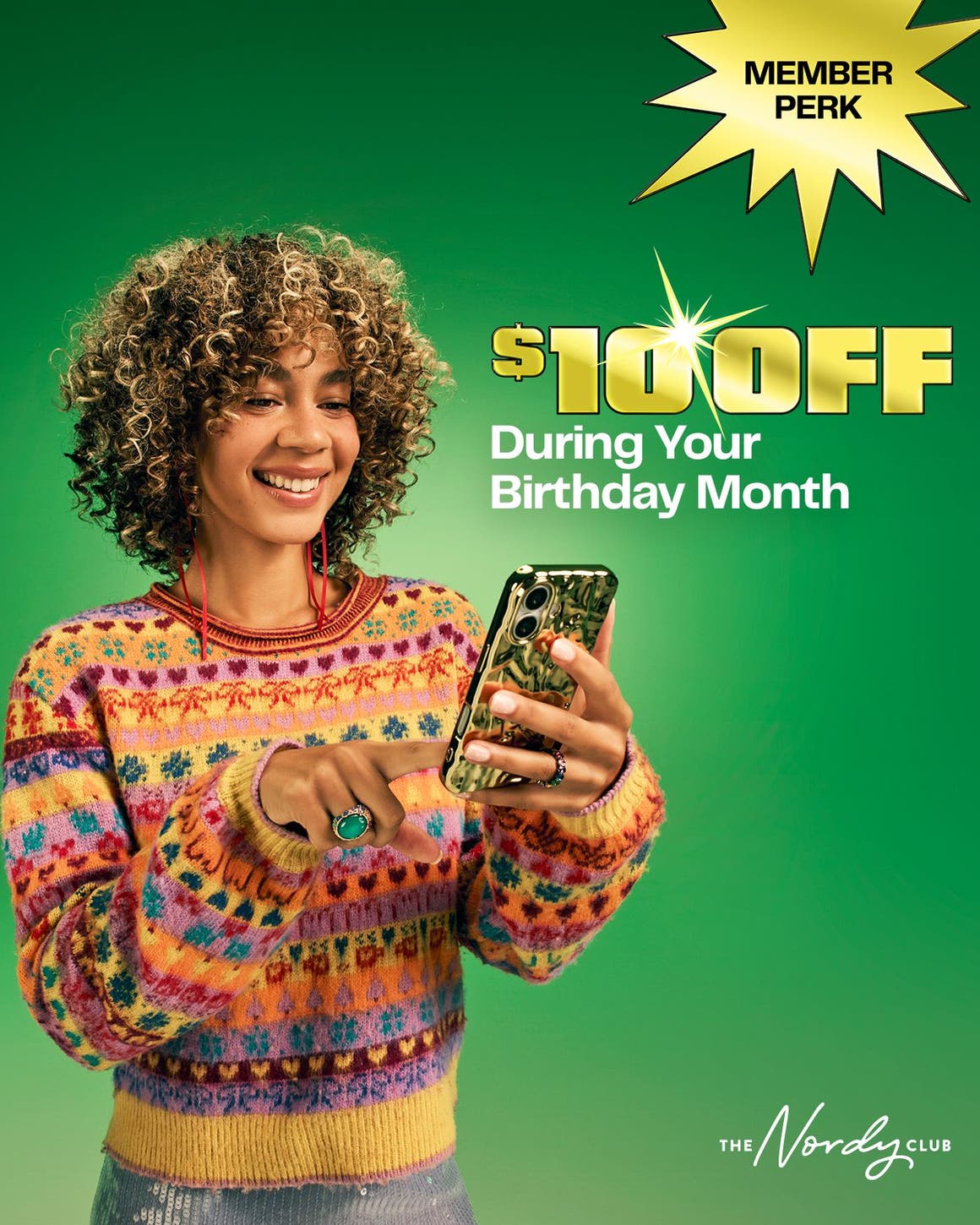 Member perk: annual birthday perk. A woman looking at her phone.