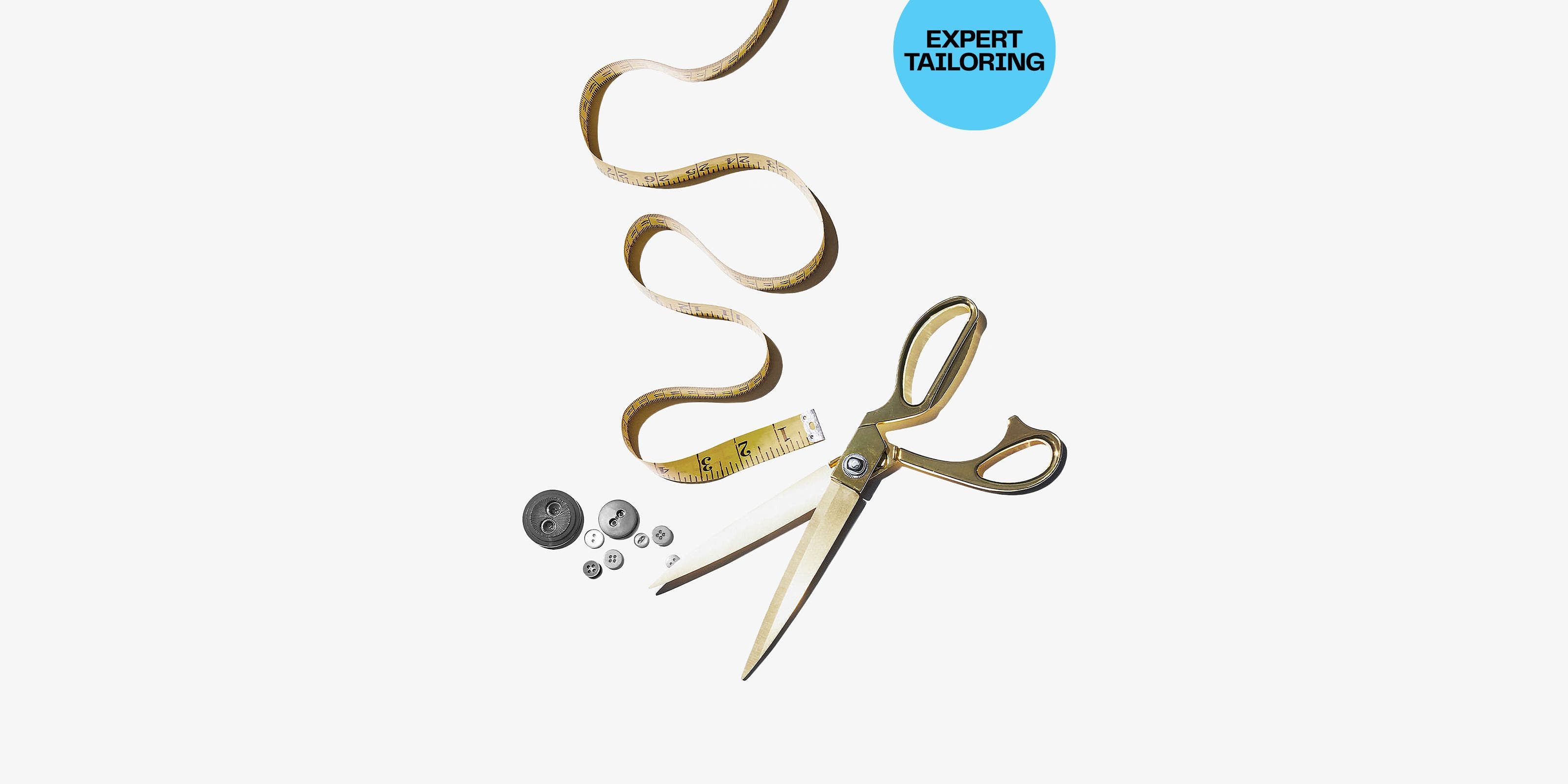 Expert tailoring. A pair of scissors, a measuring tape and buttons.