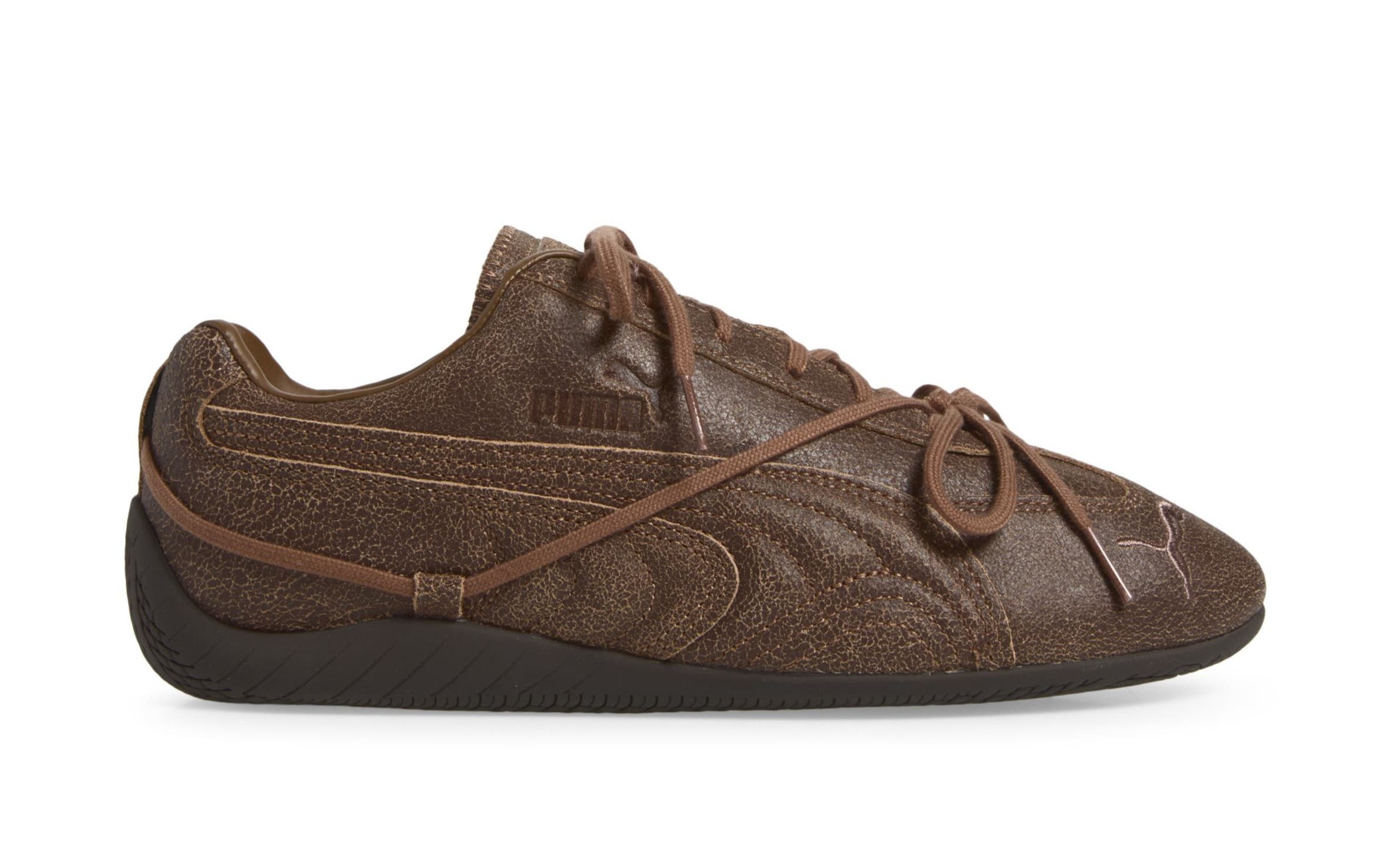 Brown PUMA sneaker.