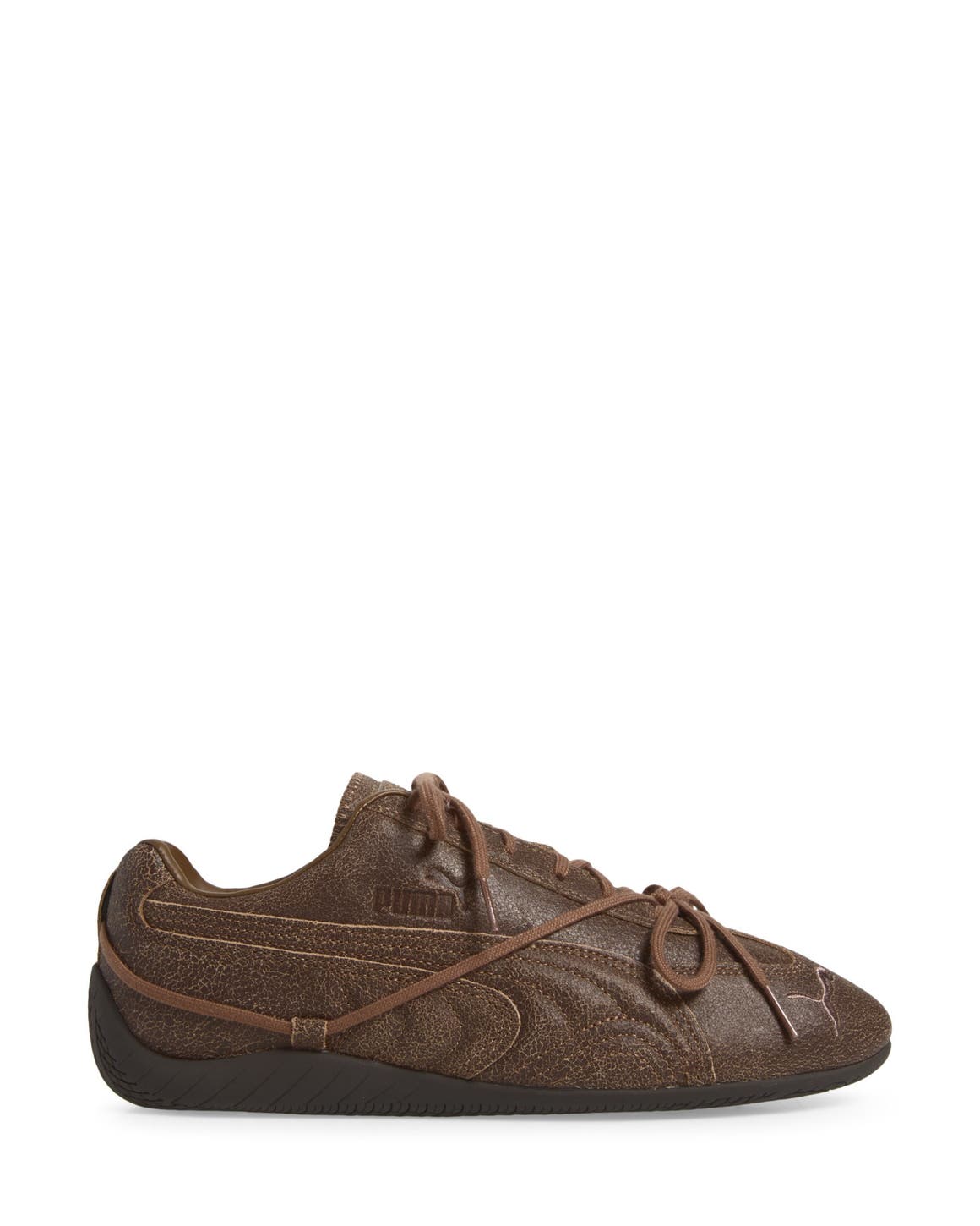 Brown PUMA sneaker.