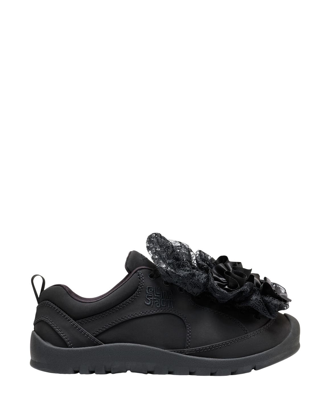 Keen sneaker with large bows.