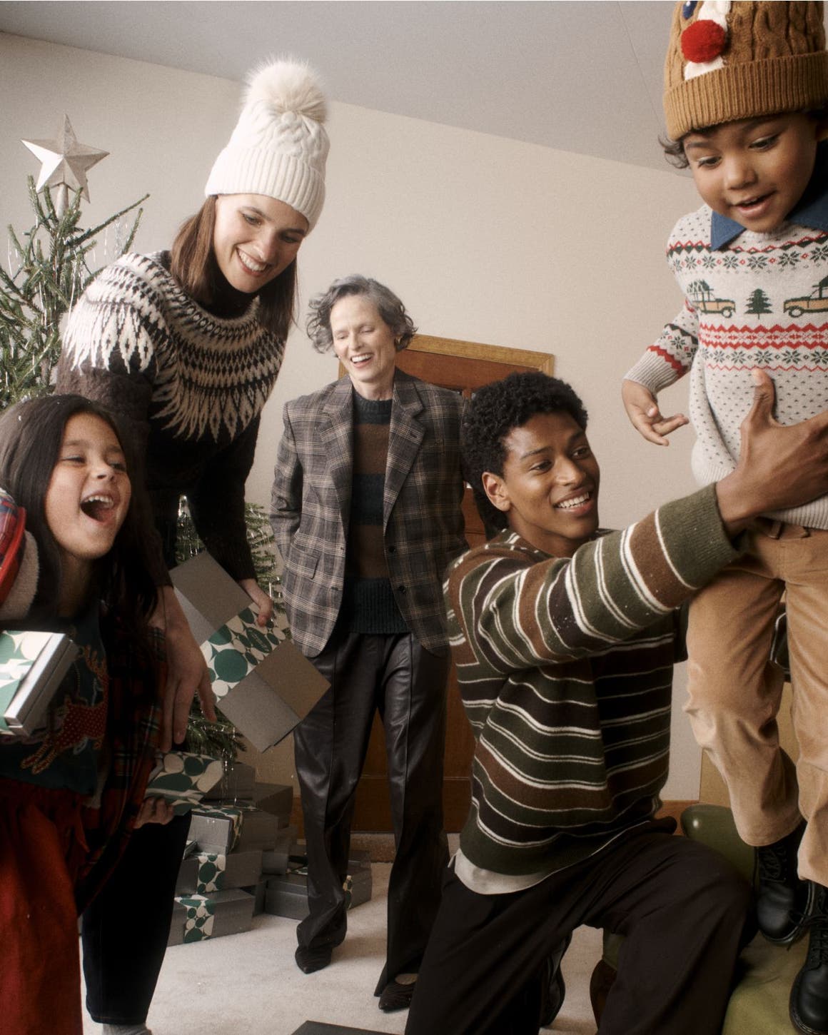 Men, women and kids celebrating the holidays.