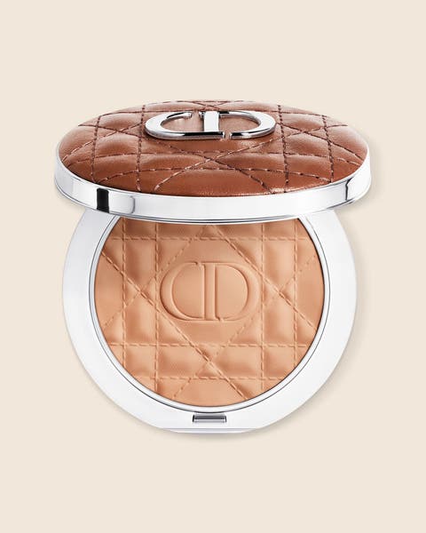 A DIOR bronzer compact with a quilted bronze lid and a matching quilted powder.