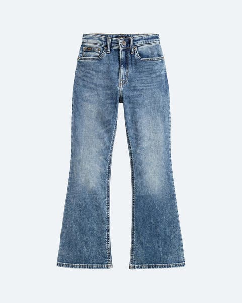 A pair of flared jeans for tween girls.