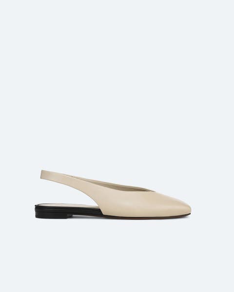 A cream slingback flat.