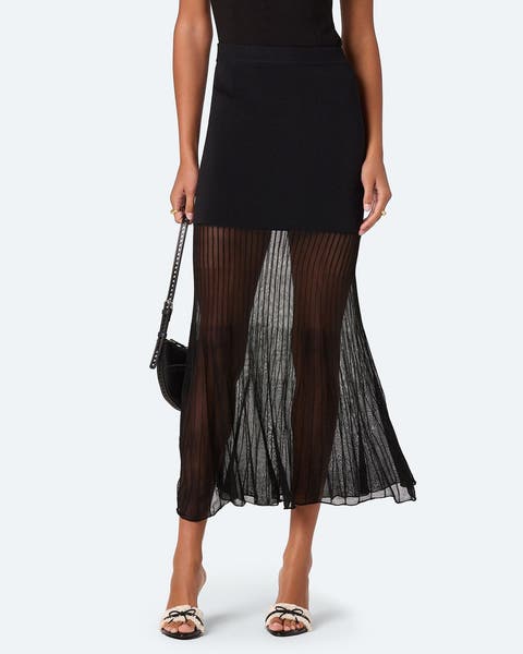 A black skirt with sheer overlay.