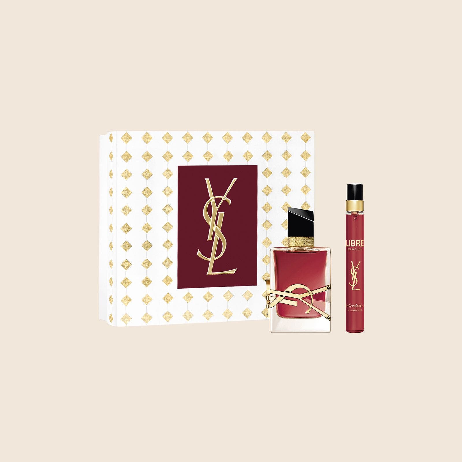 Yves Saint Laurent Libre perfume and travel spray in a white and gold gift box.