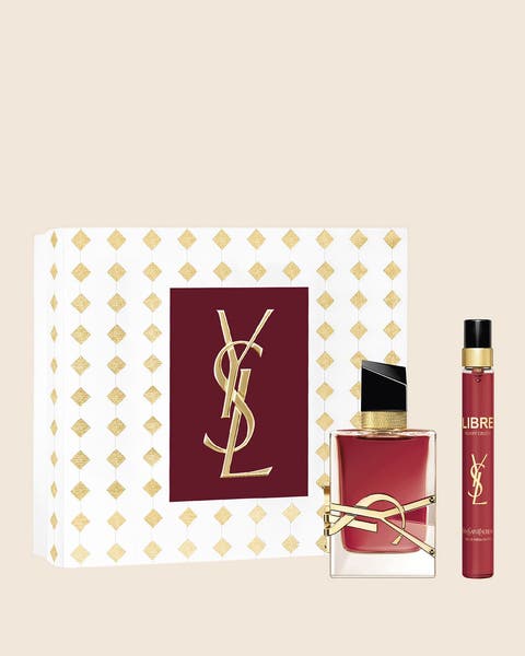 Yves Saint Laurent Libre perfume and travel spray in a white and gold gift box.
