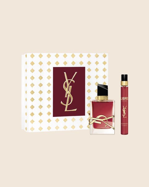 Yves Saint Laurent Libre perfume and travel spray in a white and gold gift box.