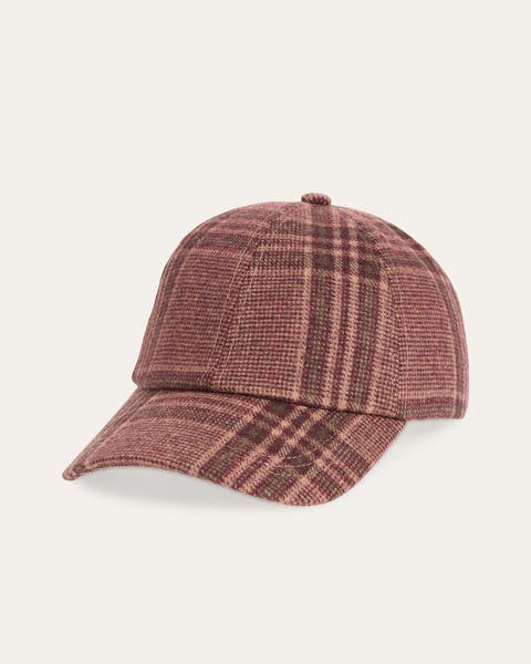 A product shot of a plaid baseball hat.
