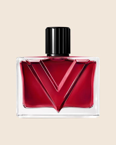 Valentino Vendetta fragrance in a square red bottle with a black cap and a V motif.