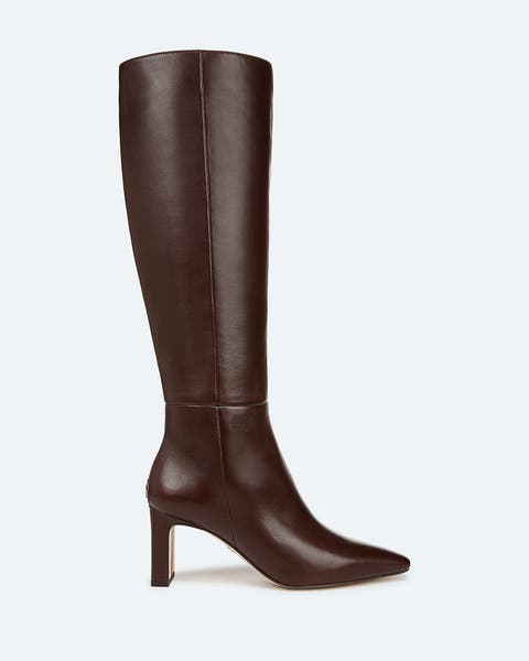 Dark brown leather stiletto knee-high boots.