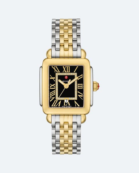 Two-tone gold and silver rectangular watch with a black dial, Roman numerals, and a diamond-accented bezel.