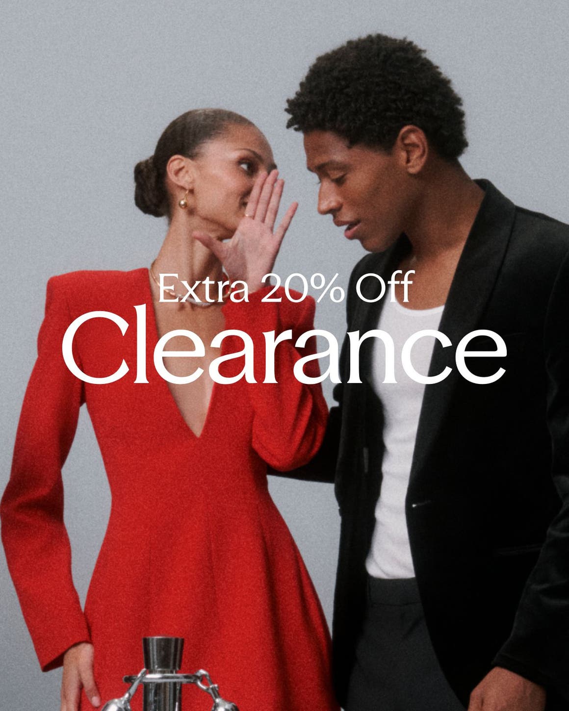 Extra 20% Off Clearance; people dressed for a party.