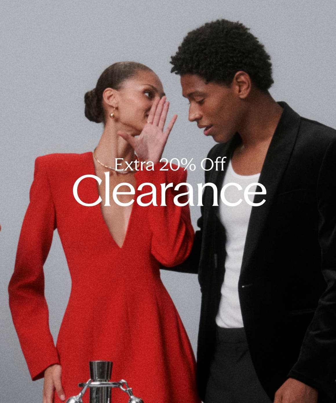 Extra 20% Off Clearance; people dressed for a party.