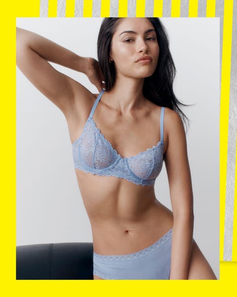 A woman in a matching bra and panties.