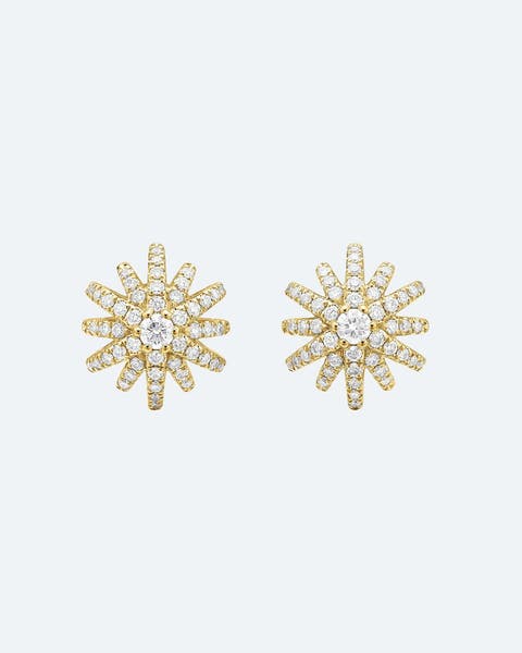 Yellow-gold starburst earrings with diamonds.