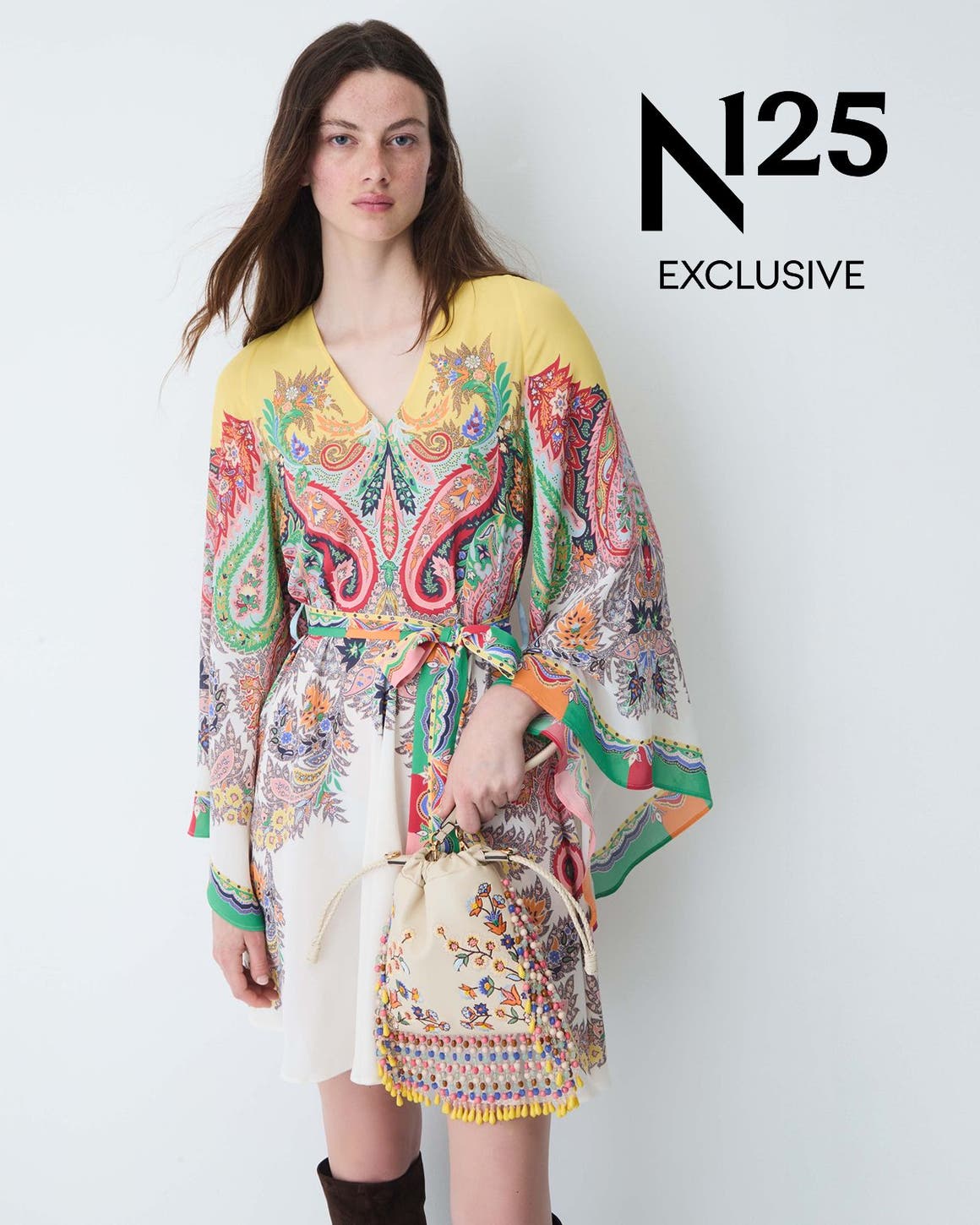 Woman wearing a printed dress from Etro.