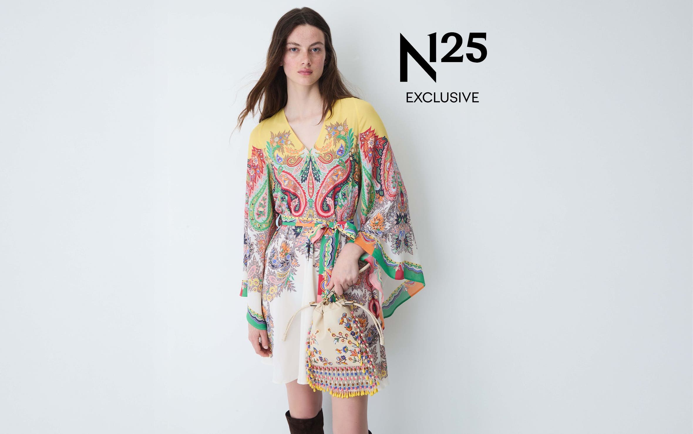 Woman wearing a printed dress from Etro.