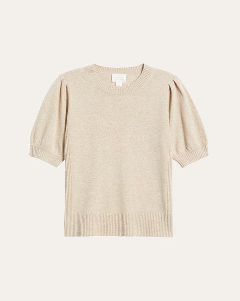 A product shot of a white blouse.