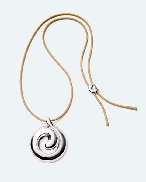 A silver spiral-detail necklace.